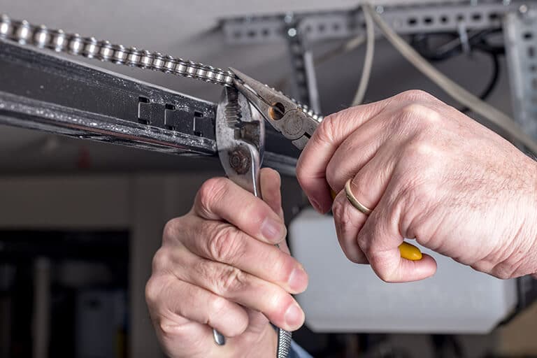 How To Repair A Broken Garage Door Torsion Spring
